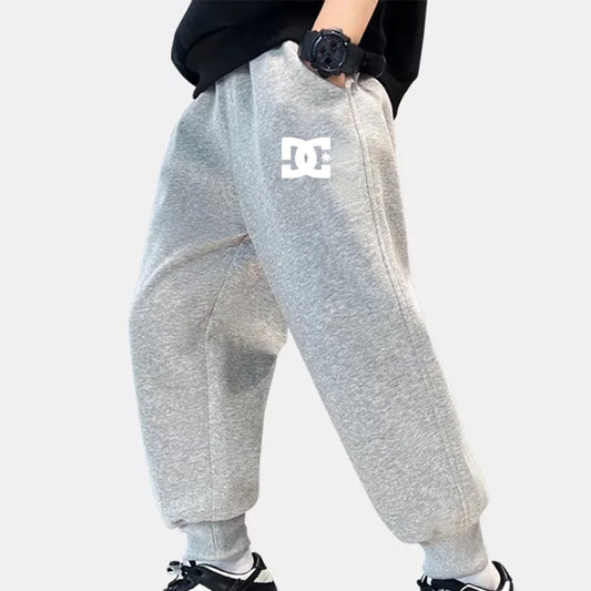 Calças de moletom compridas infantis, calças de moletom infantis estampadas com letras DC para homens e meninas, calças de moletom infantis casuais e confortáveis